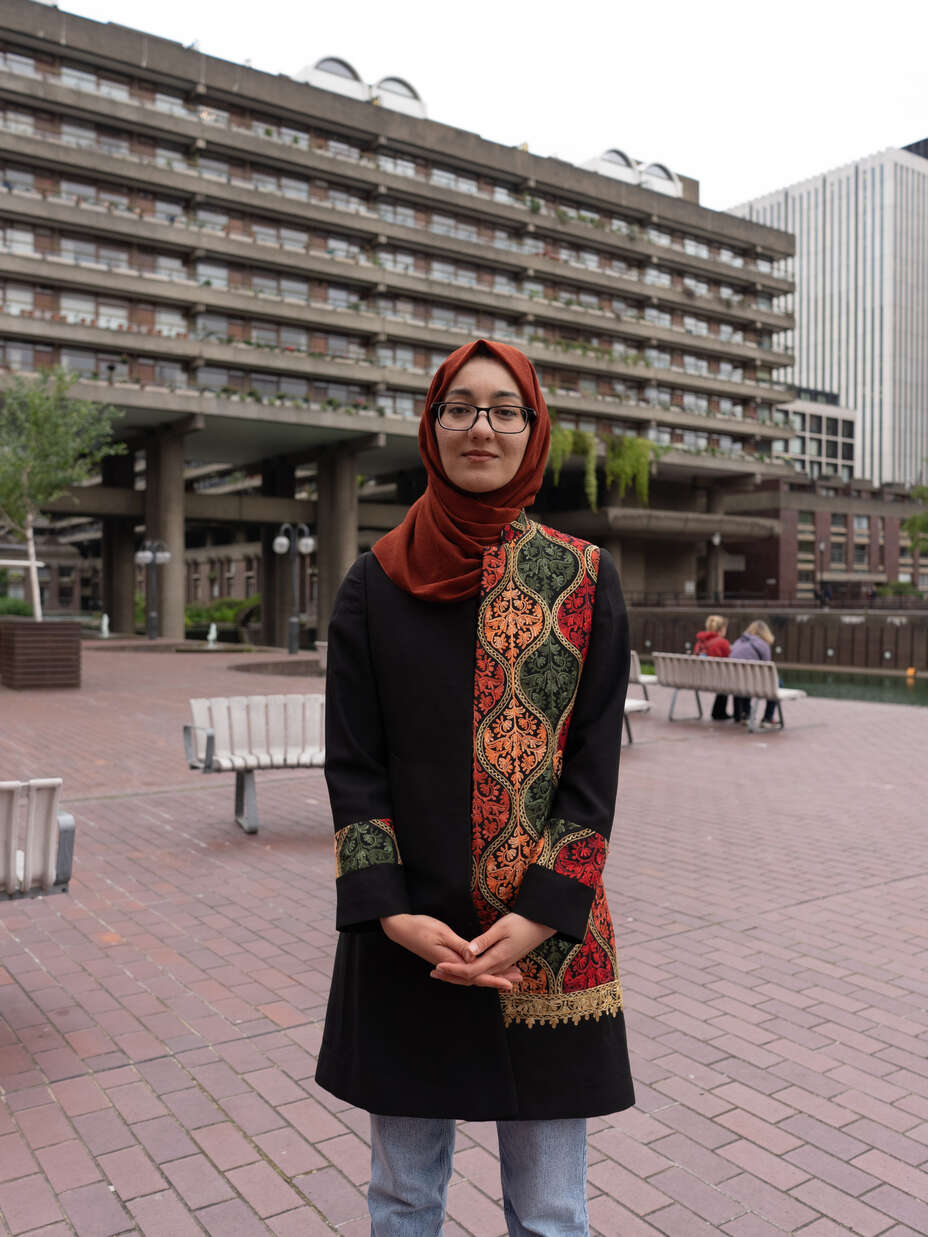 Woman standing in front of Barbican in London
