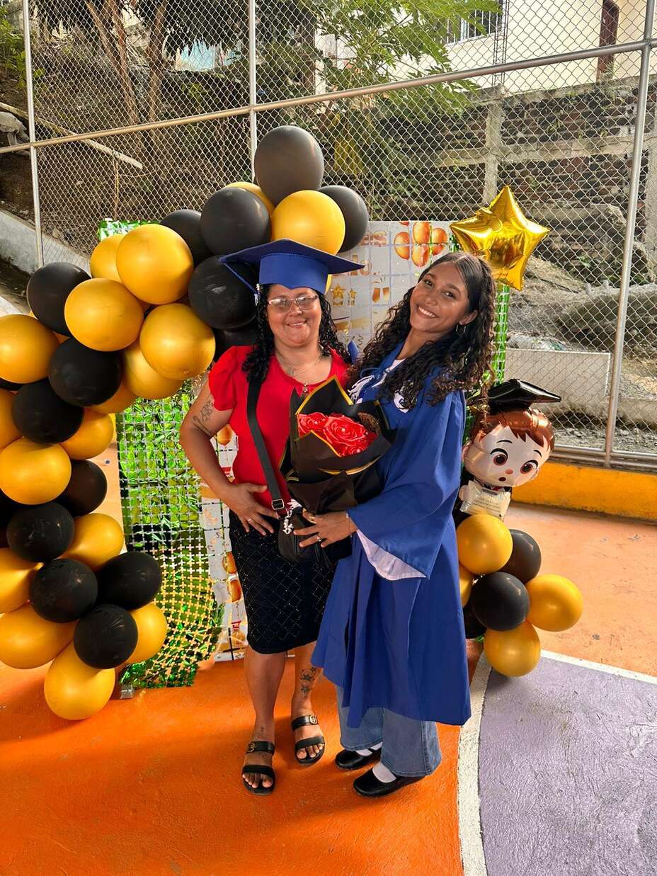 Yessica and Yari at Yari's graduation.