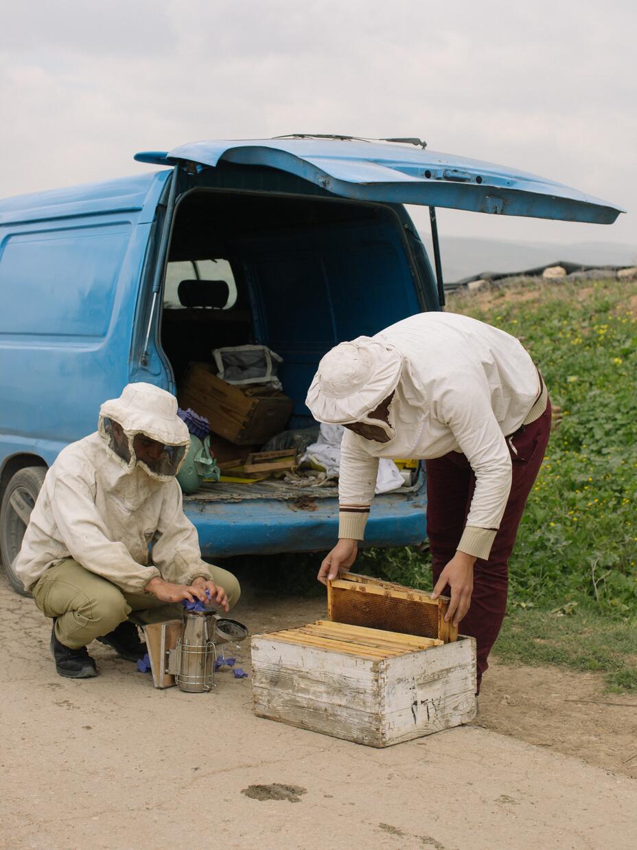 Hudaifah and his friend getting prepared to go to their apiary in Jordan Valley near Amman and care for their bees