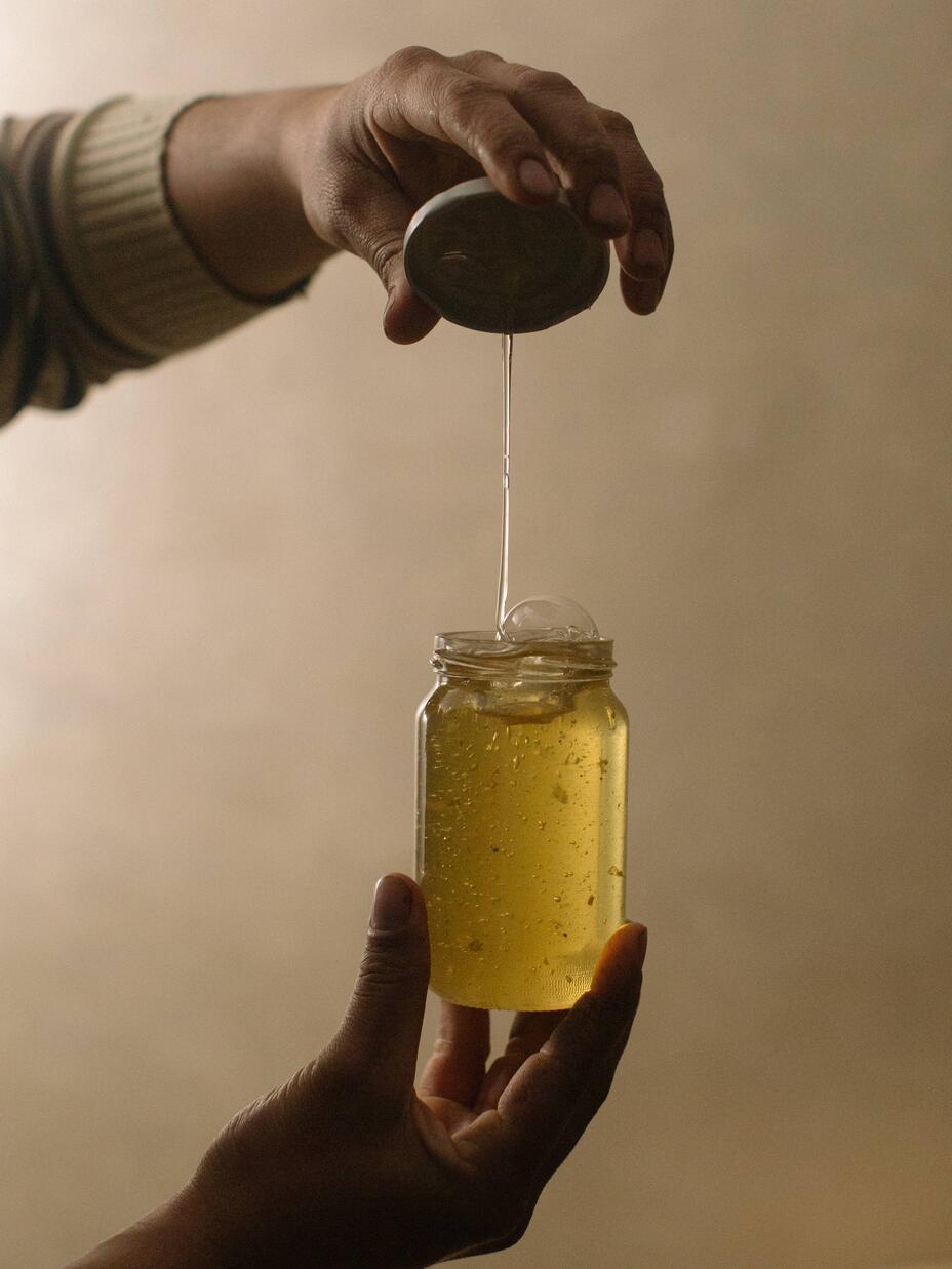 Honey pouring from a jar