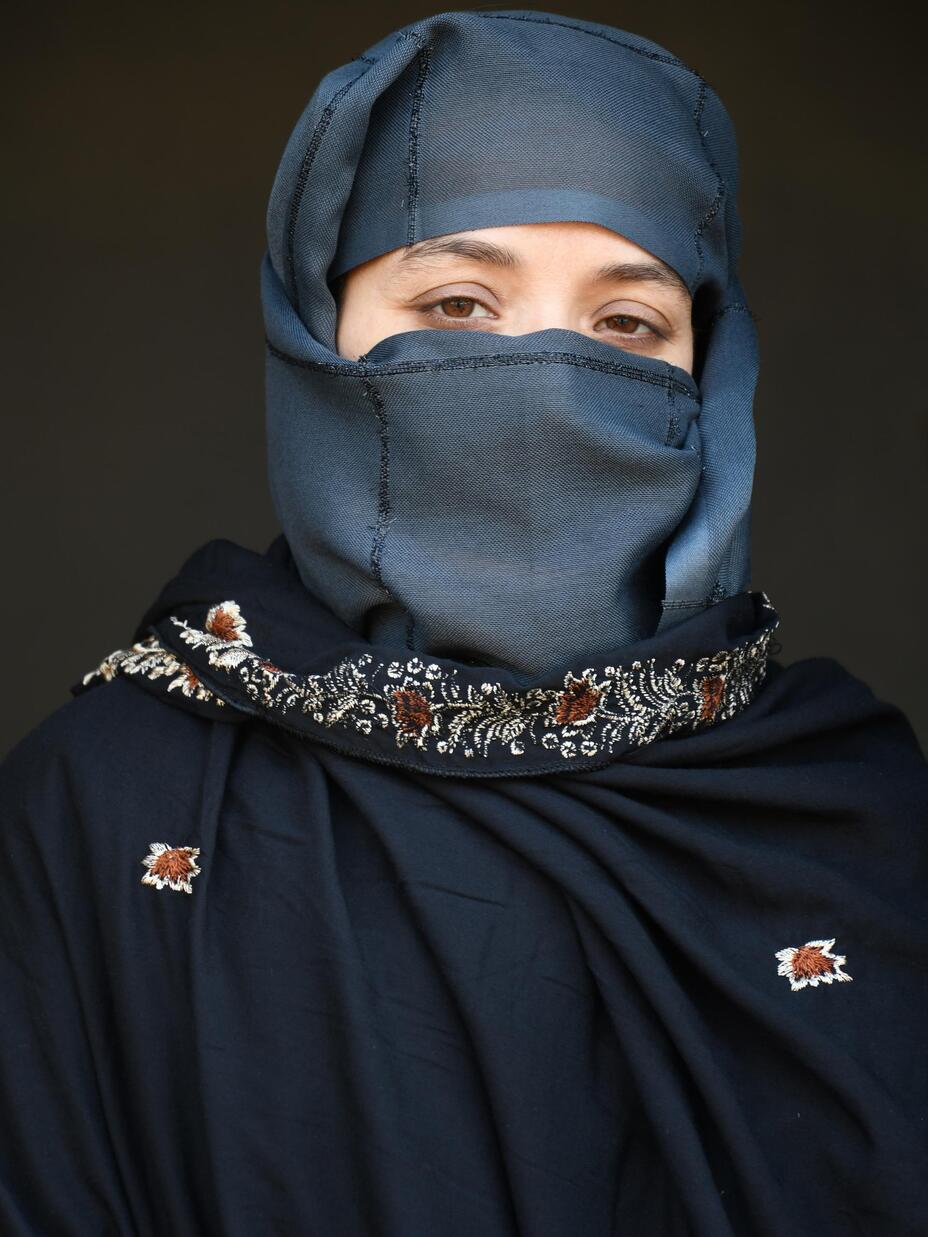 Headshot of Karima Sultani looking into the camera.