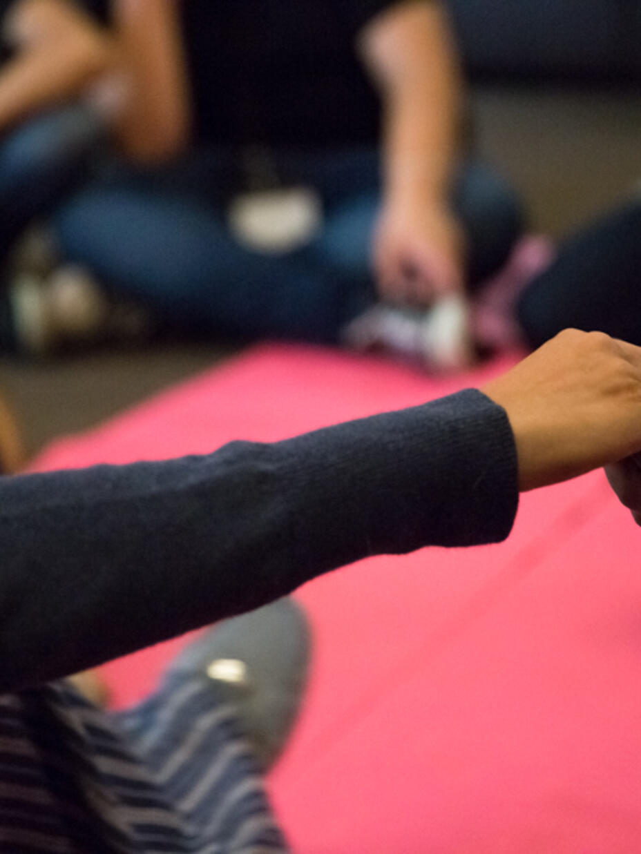 Refugee community supporting each other and holding hands