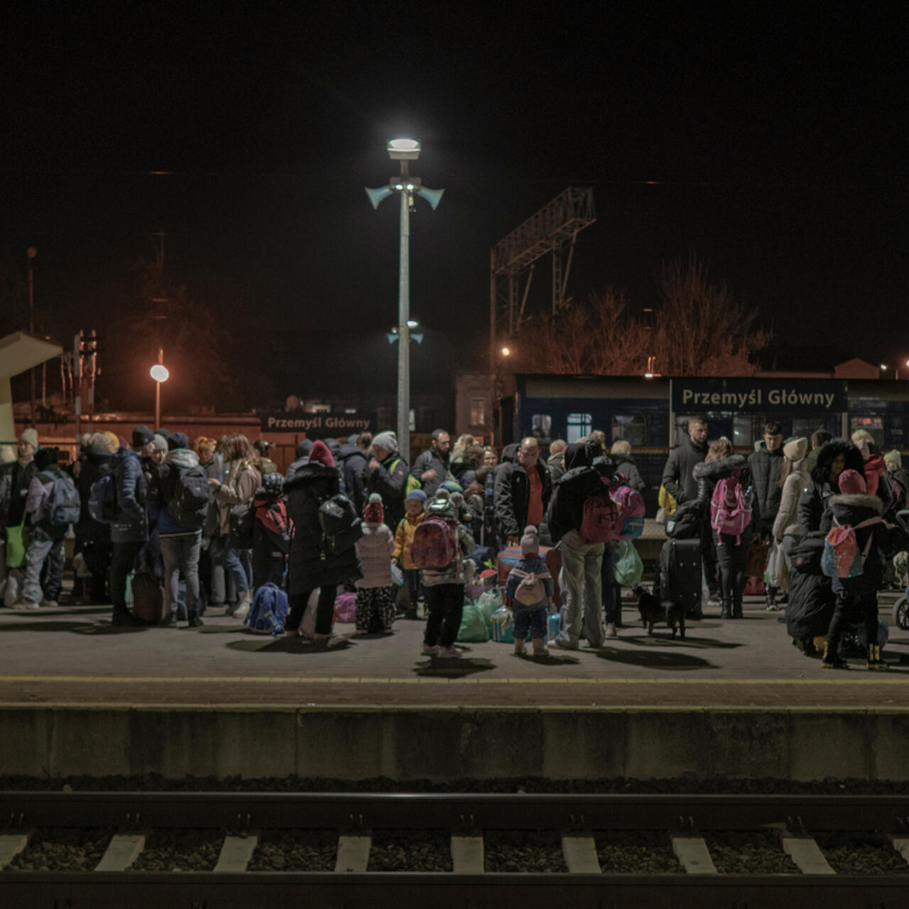 Ukrainian refugees gather at Przemysl railway station