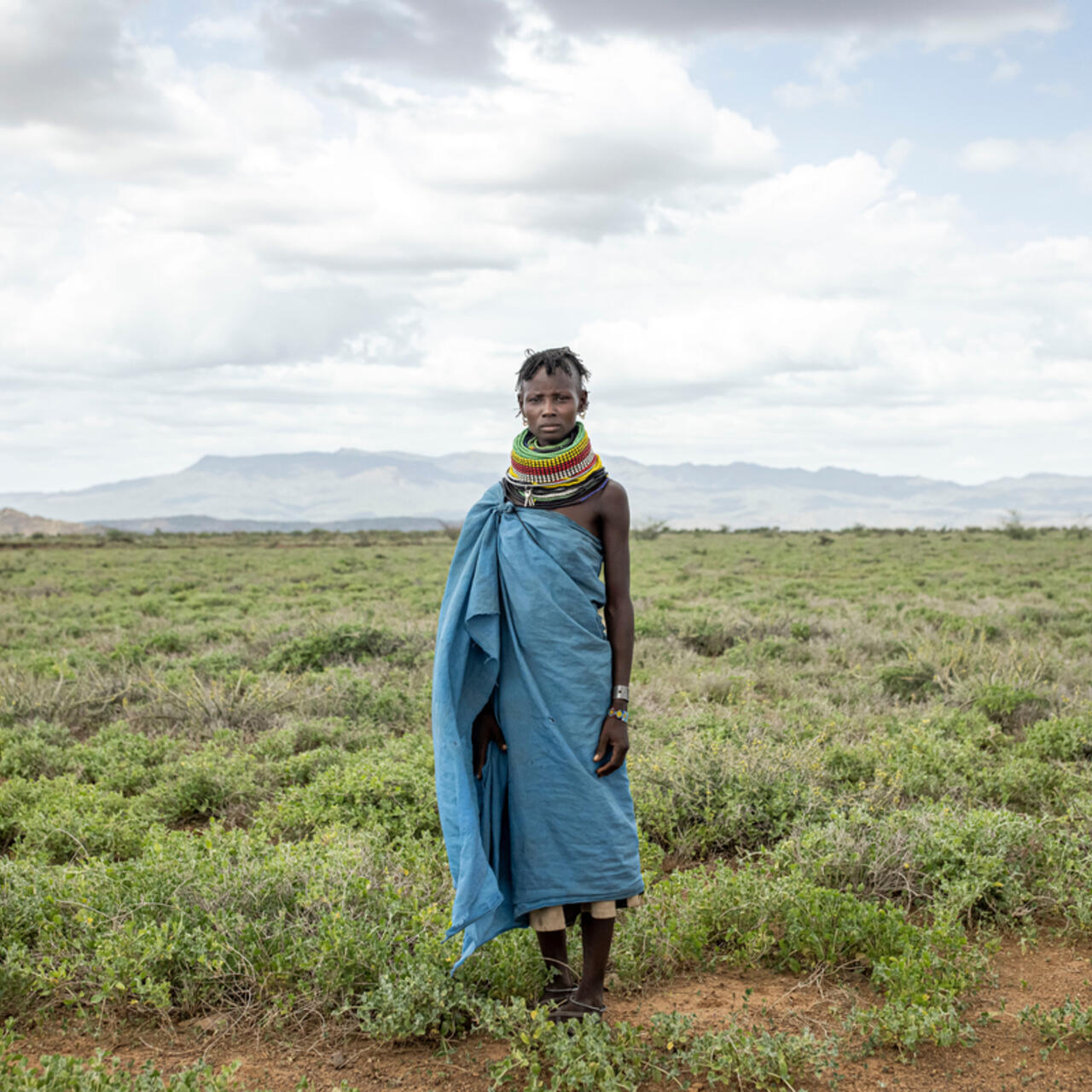 Lokiyoto Ekal, 30 poses for a portrait near her home in RukRuk village in Turkana, Kenya
