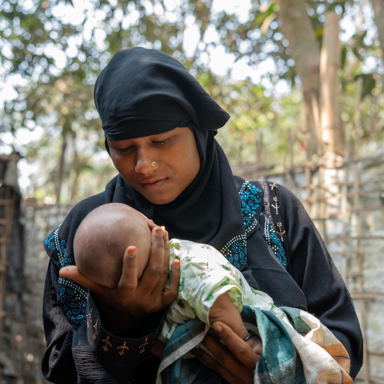 Samira with her newborn baby.