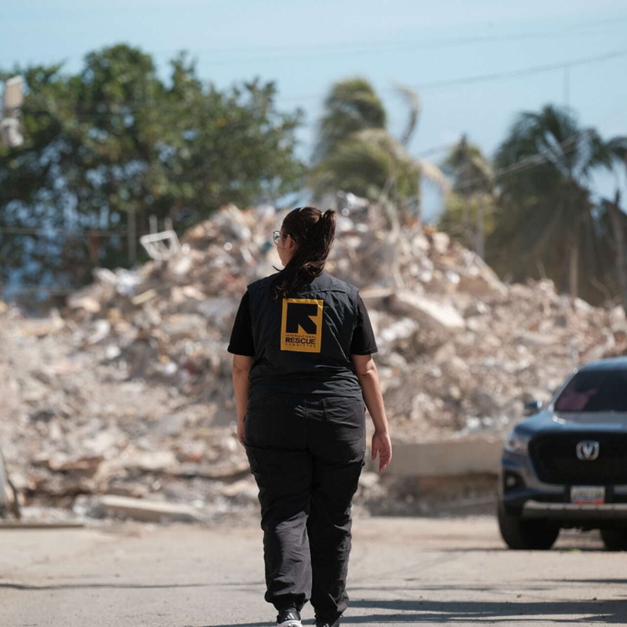  IRC staff members in La Guaira survey the destruction of the twin earthquakes on June 24.