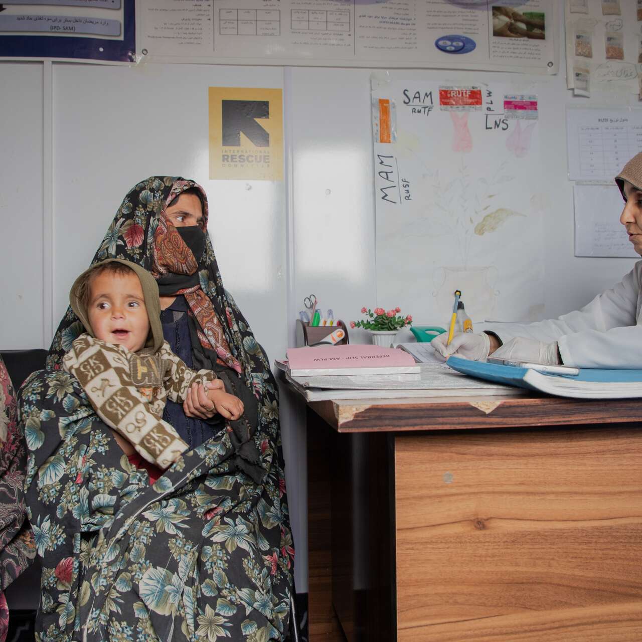Younis and his family receive medical support at an IRC clinic in Herat, Afghansitan.