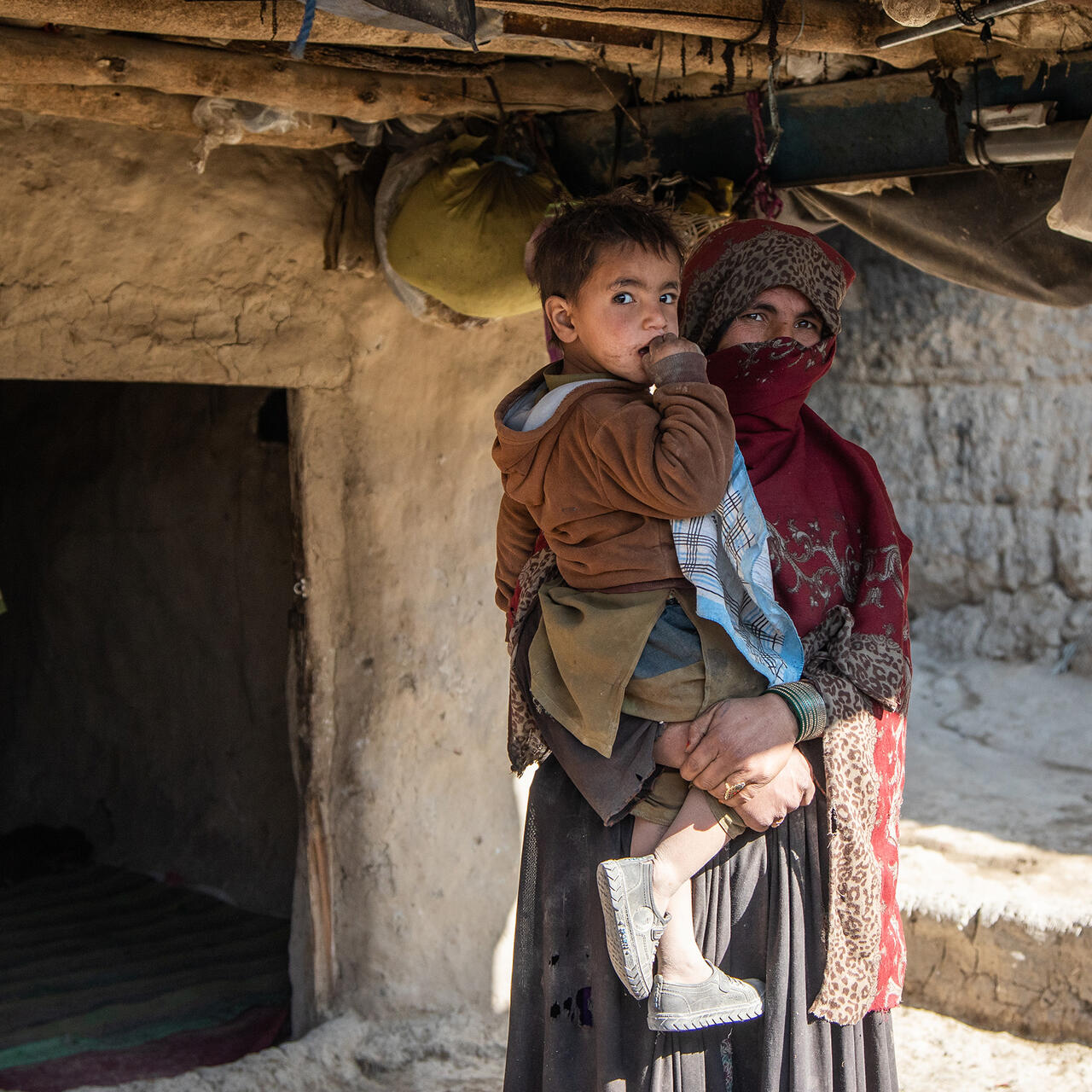 A woman and her child in a camp in Kabul, Afghanistan