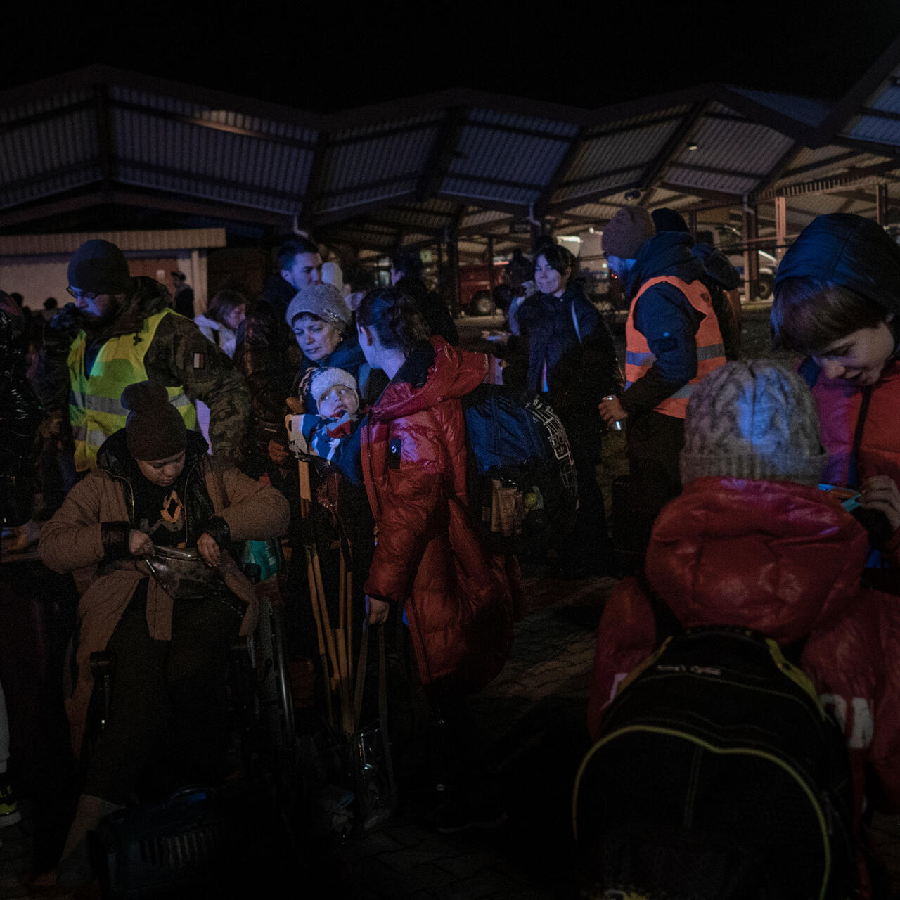 Ukrainian refugees gather at Przemysl railway station. 