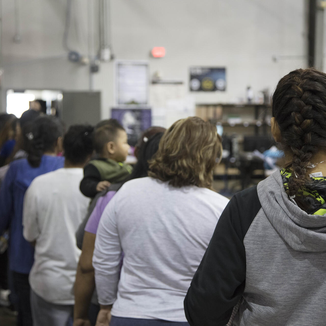 U.S. Border Patrol agents conduct intake of border crossers at the Central Processing Center in McAllen, Texas, Sunday, June 17, 2018.