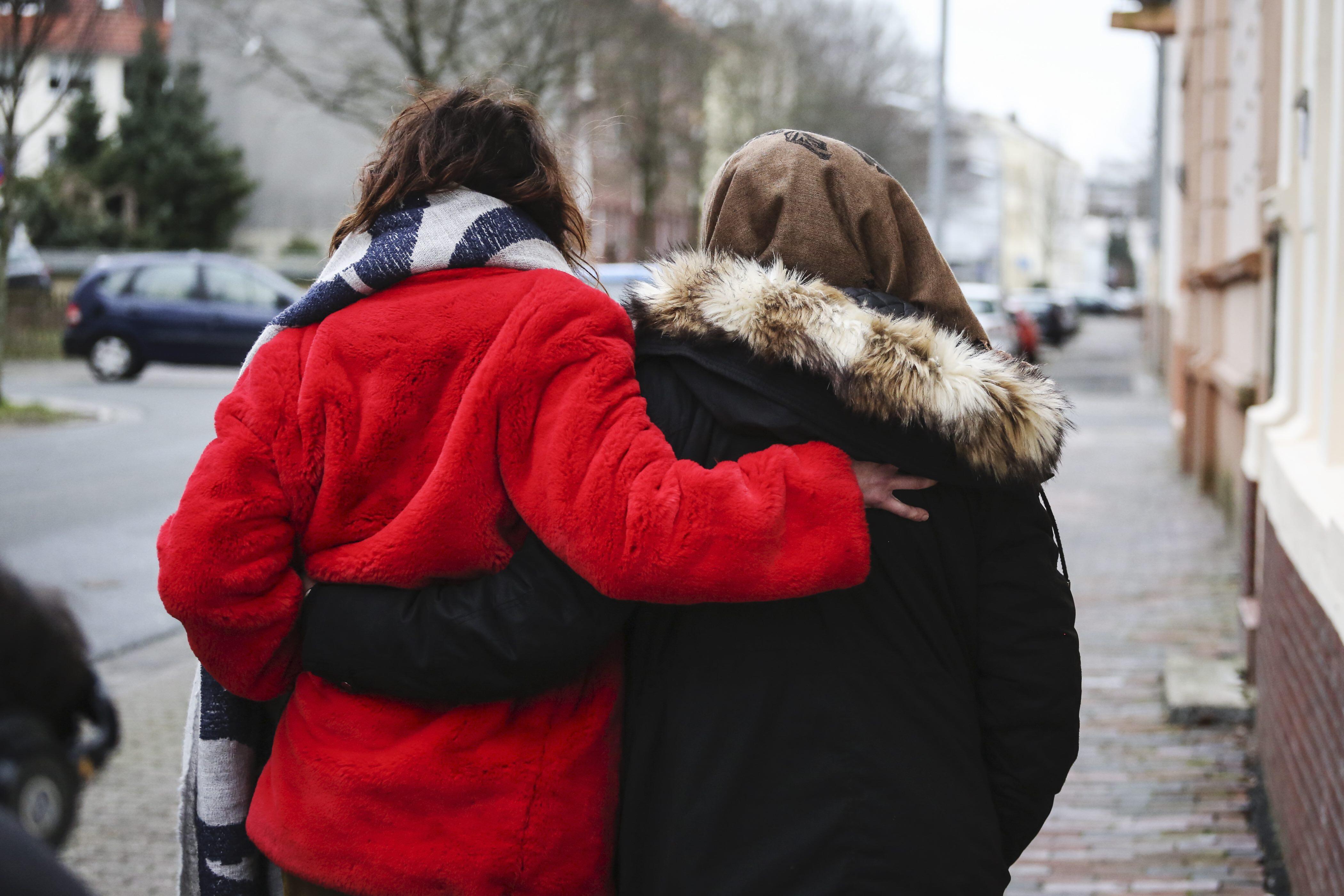 Lena Headey walks with Marwa outside her home in Germany