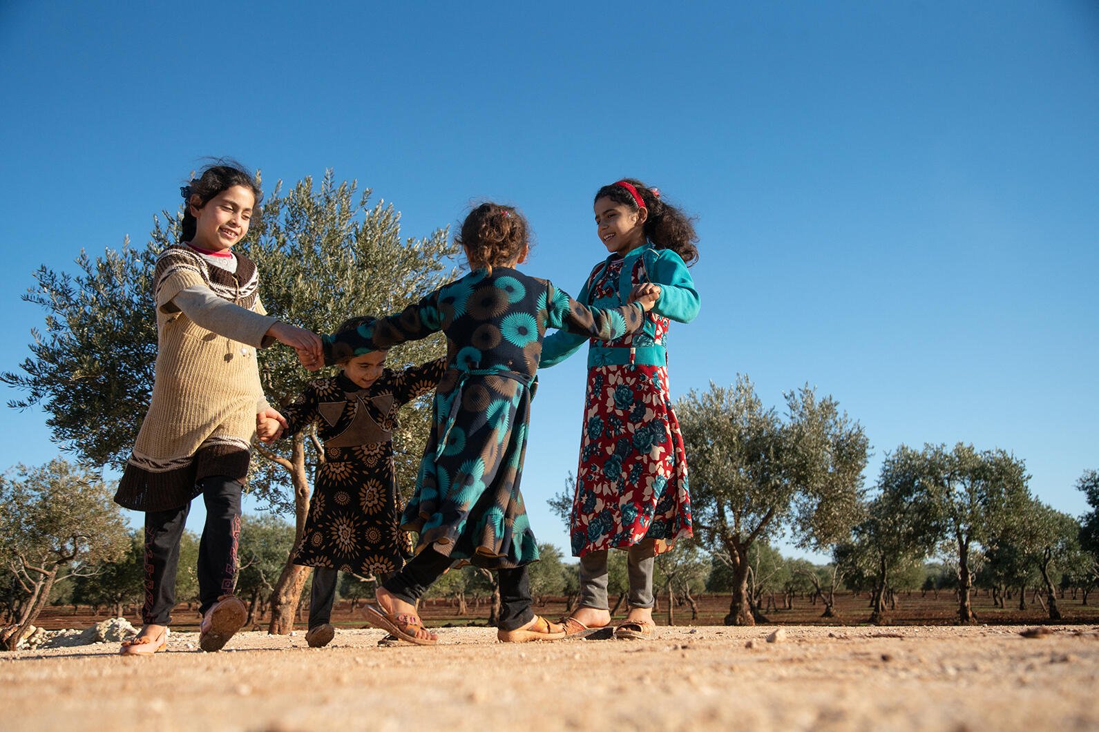Children play in Syria
