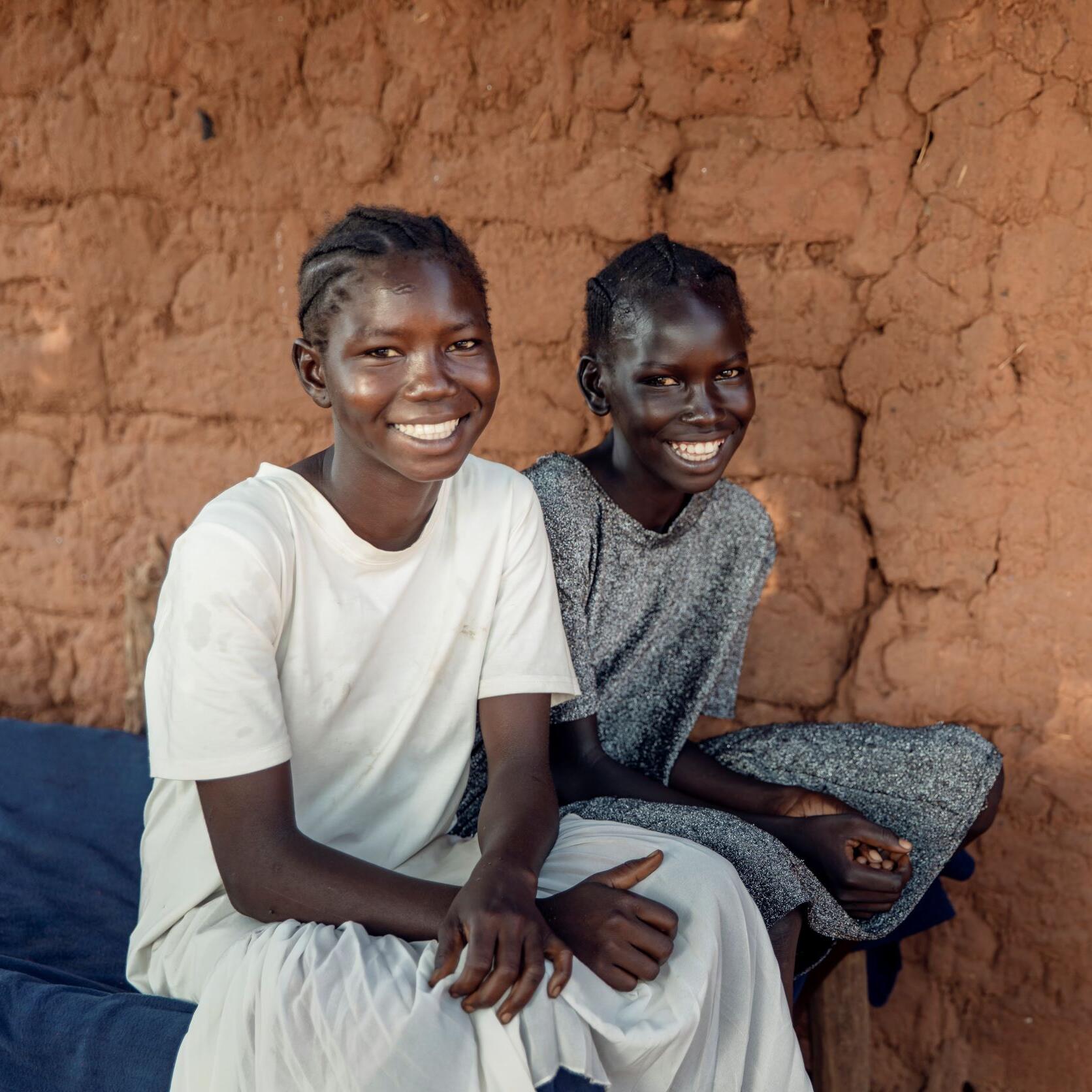 Two smiling teenage girls 