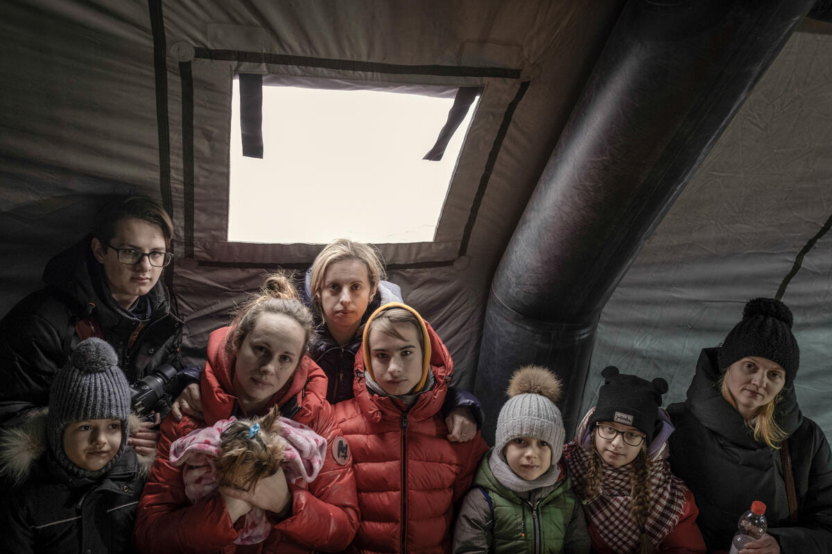 Ukrainian refugees gather at Medyka border crossing point, Poland