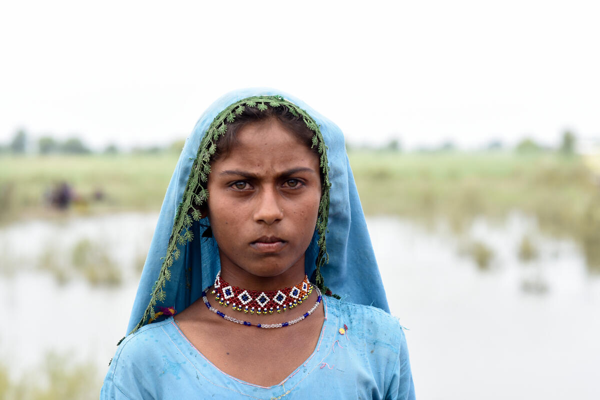 A young girl is seen in her culture attire during the flood emergency in Sindh, Pakistan