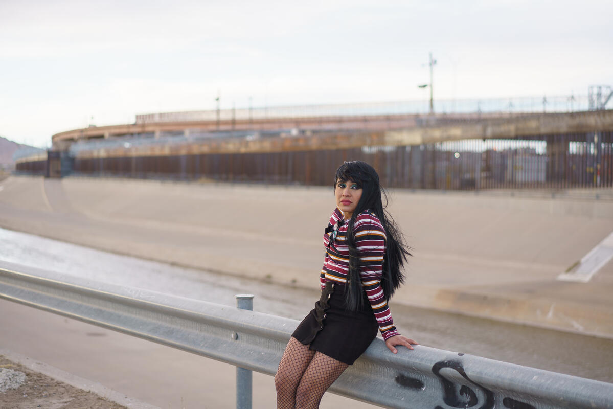 Image of Fernanda standing against a guard rail