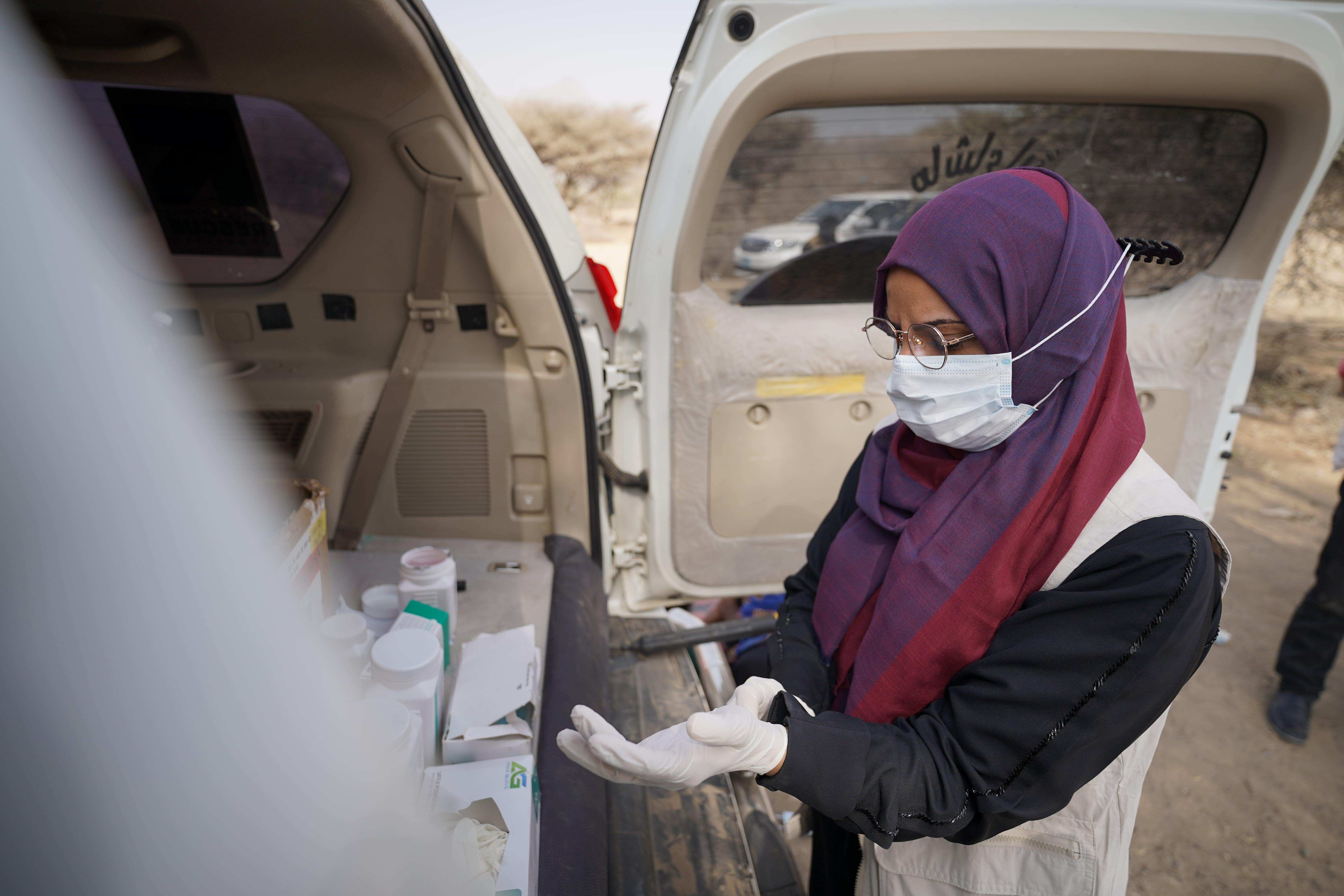 Dr. Waood Afara during her visit and inspection of the mobile clinic vehicle work progress. She makes sure that everyone gets the proper diagnosis and receives the free medicines provided by IRC.