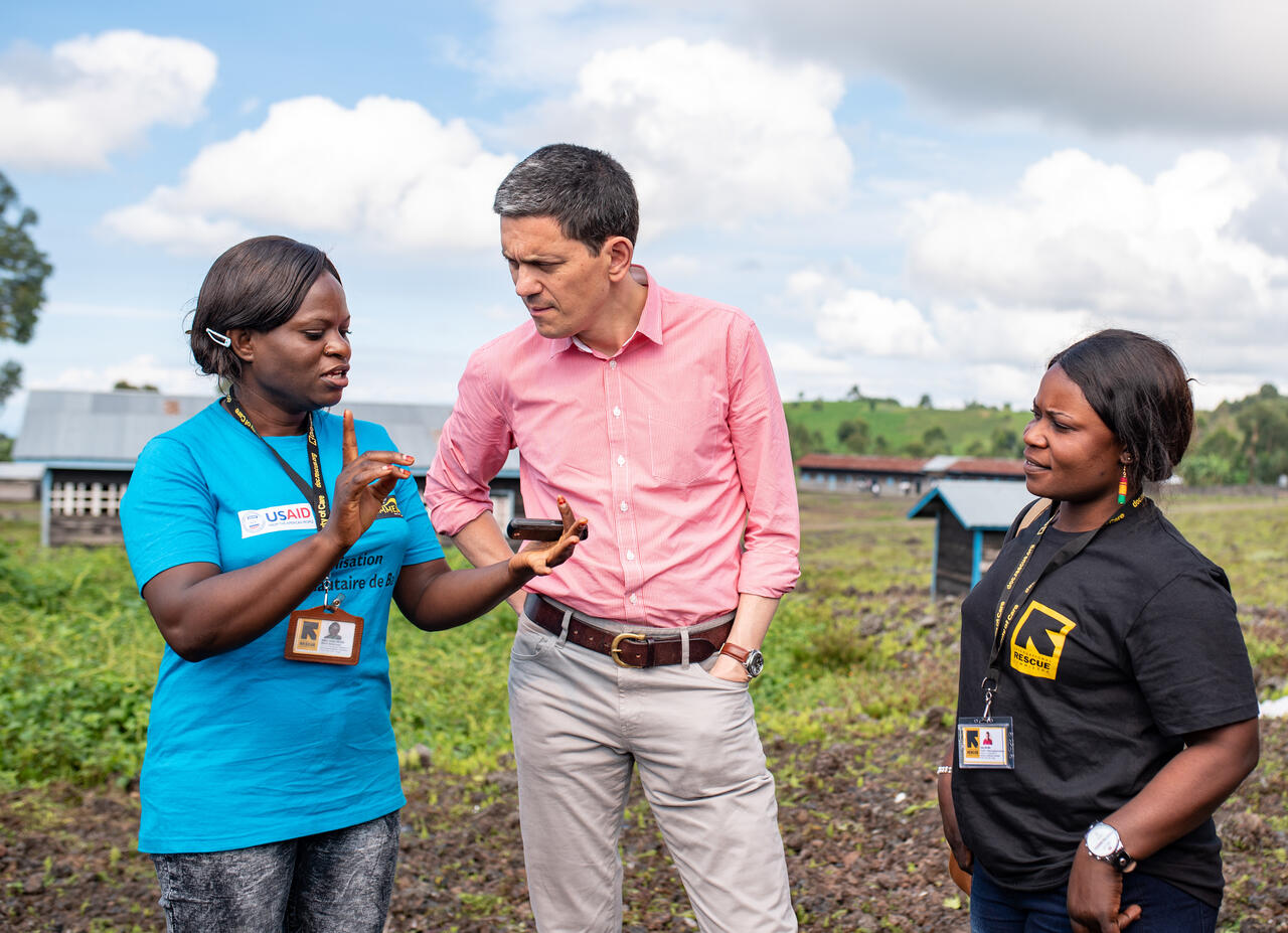 David Miliband with IRC-workers