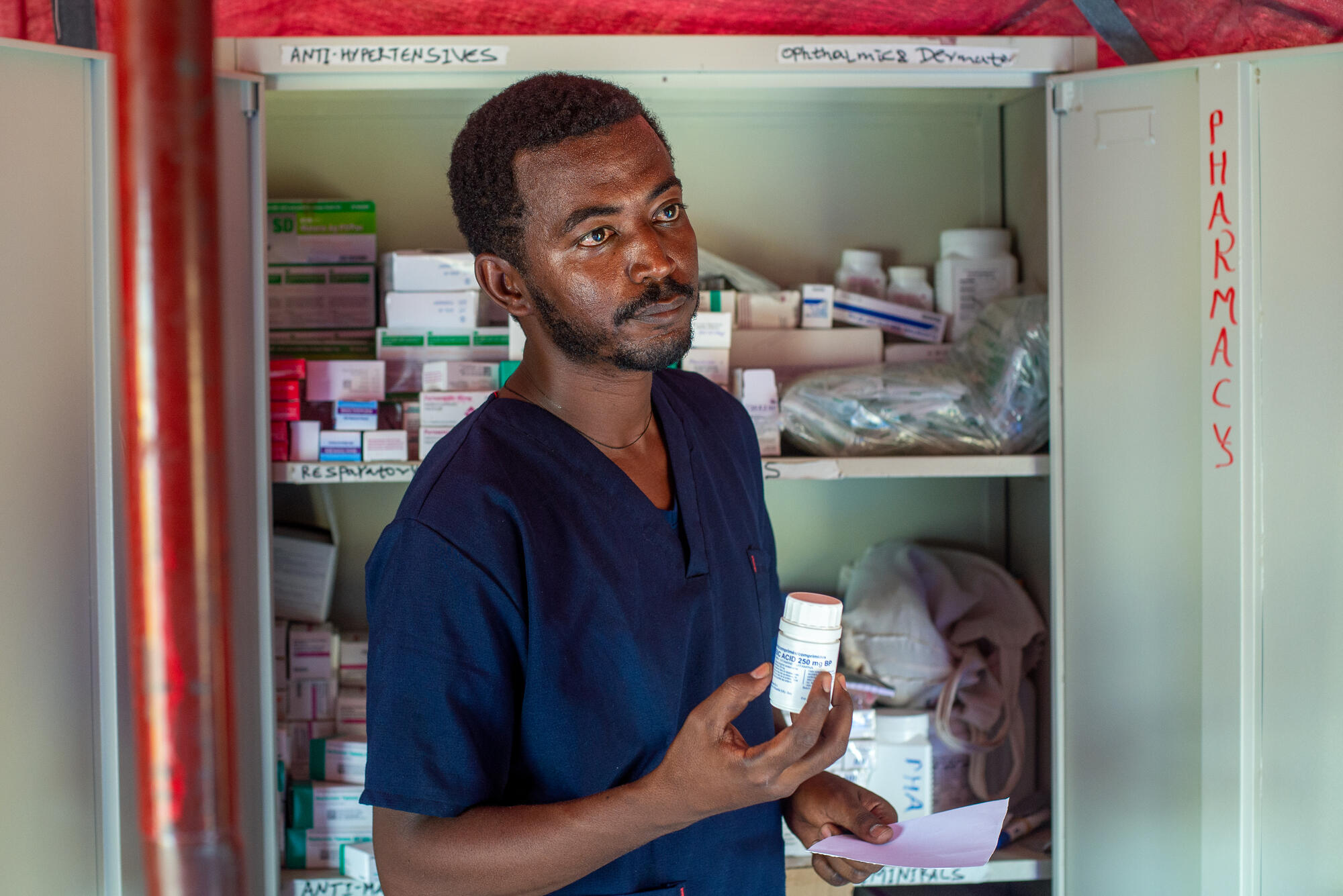 Hayelom Haftu, Tigrayan pharmacist at IRC health centre in Tunaydbah Refugee Camp, East Sudan