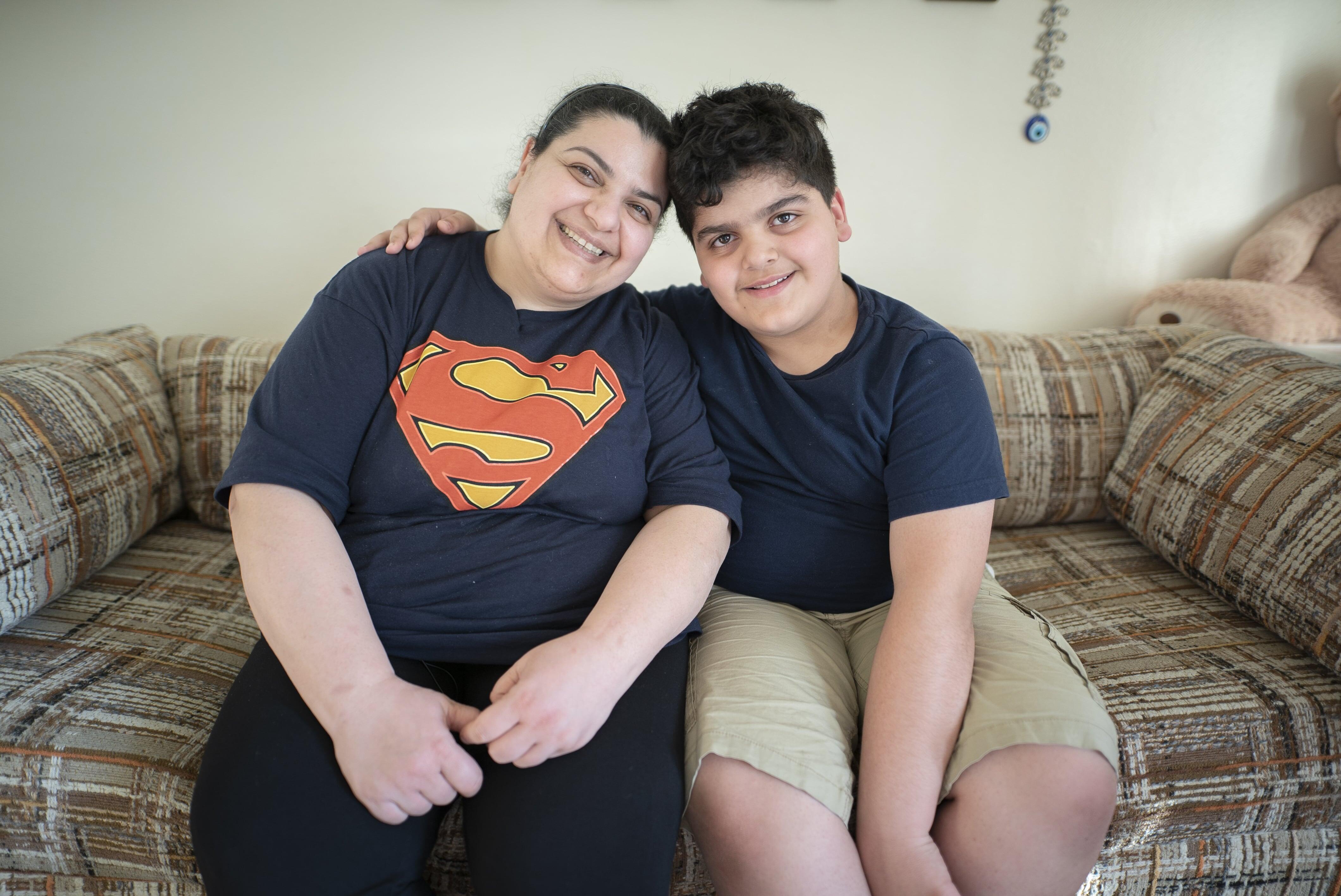 Iraqi refugees Taghreed and her 10-year-old son Yousif at their home in Seattle