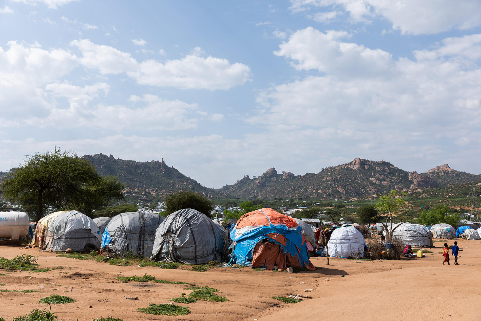 Landscape image showing Qoloji camp, including the temporary houses where IDPs live.