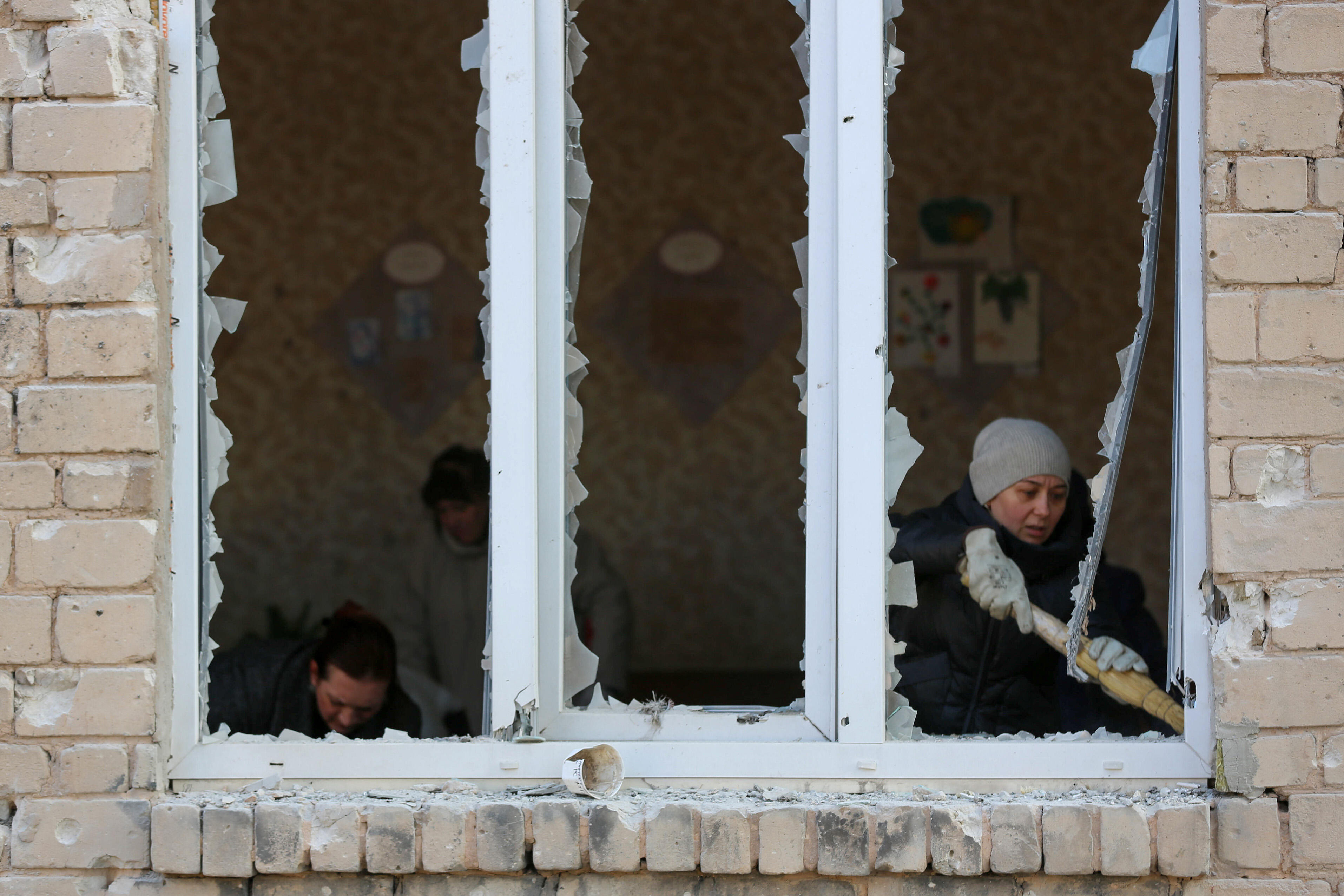 A view of a broken window at School in Ukraine after a shelling attack. 