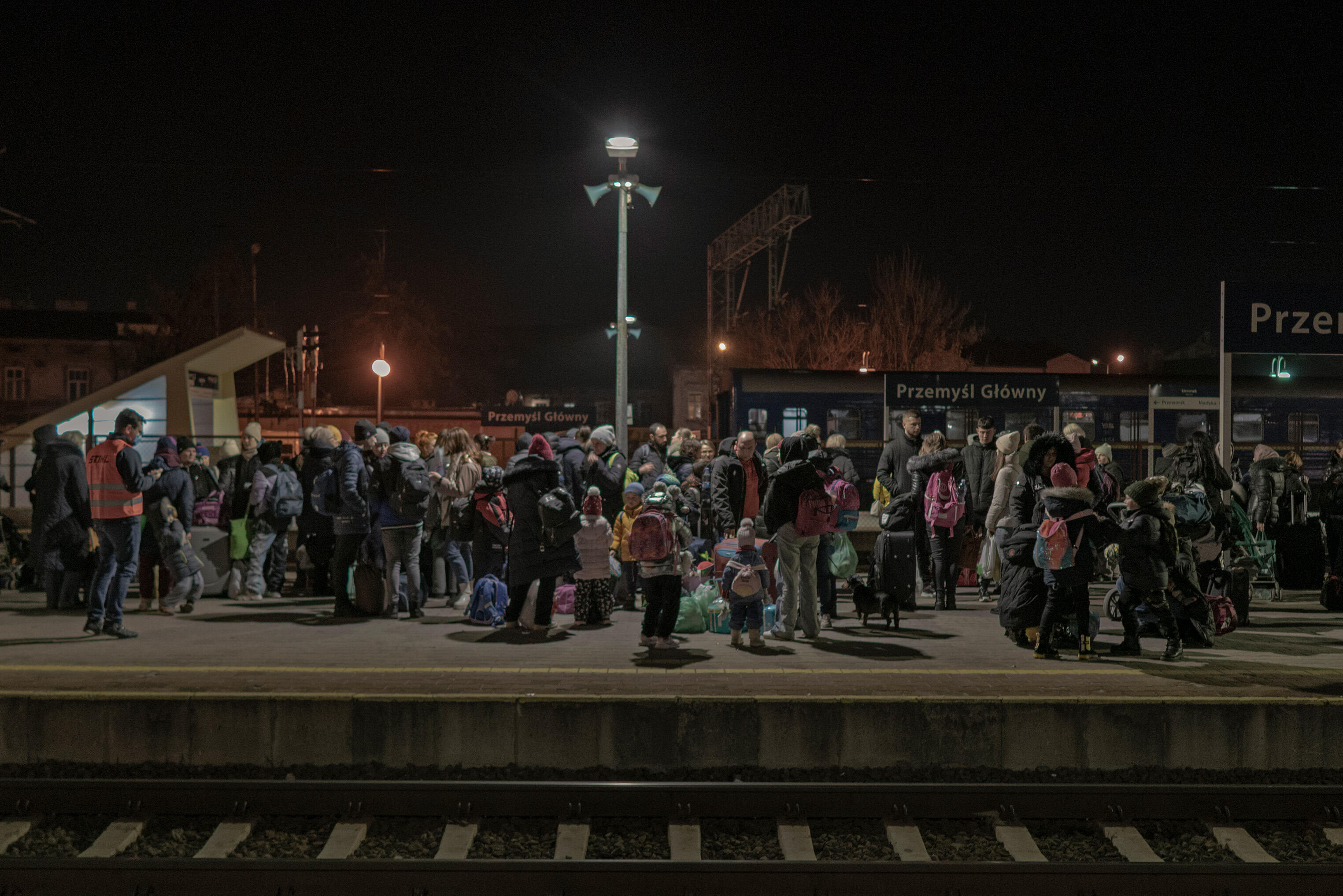Ukrainian refugees gather at Przemysl railway station.