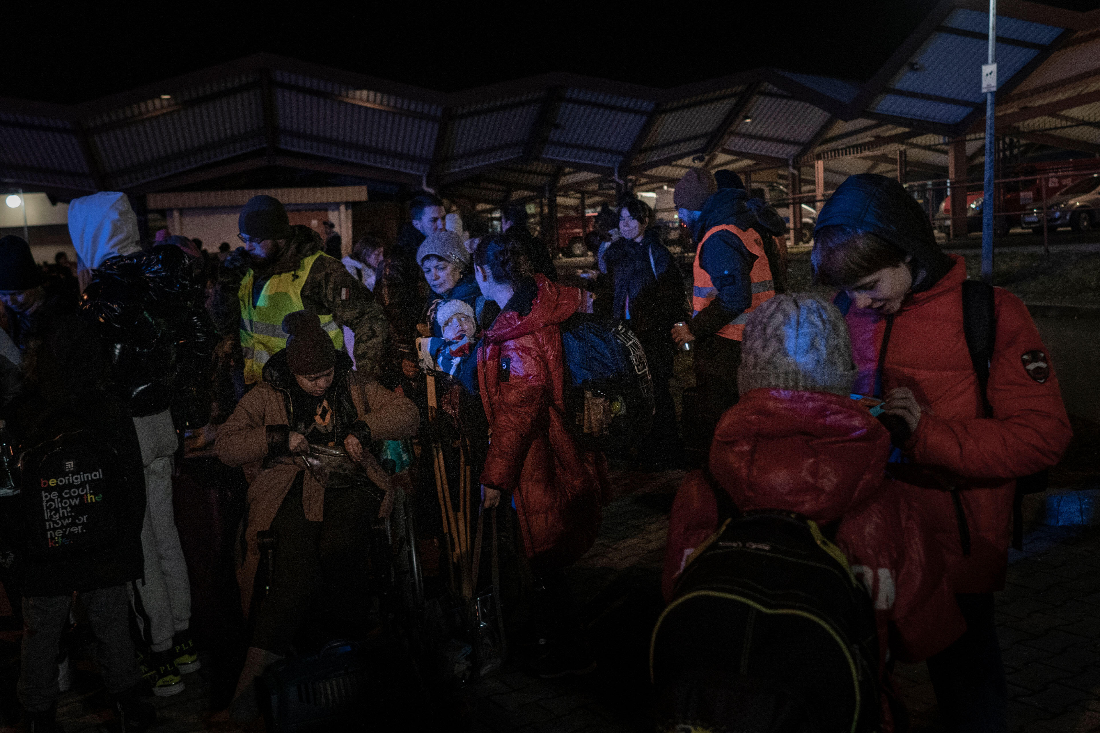 Ukrainian refugees gather at Przemysl railway station. 