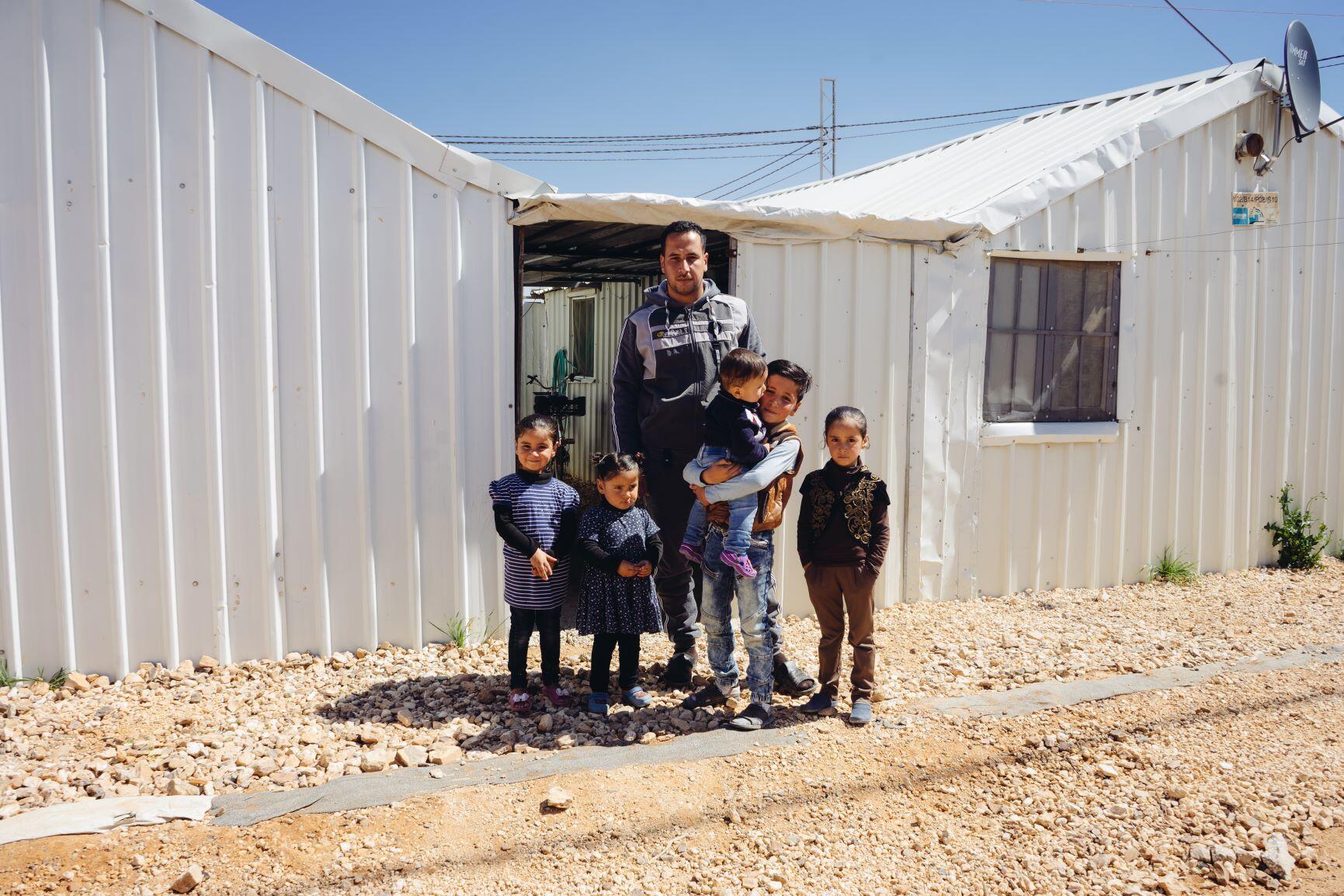 Mohammad with his family in Jordan