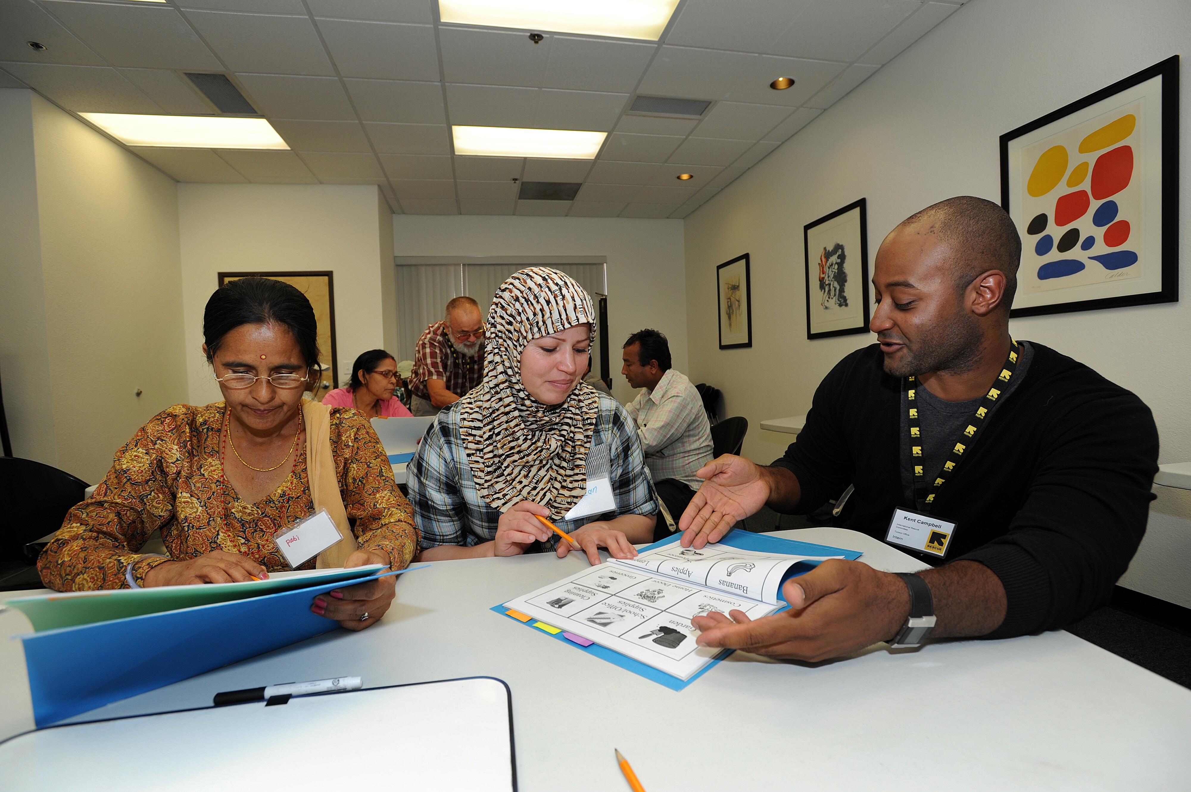 Refugees learning English as part of employment readiness training in the United States