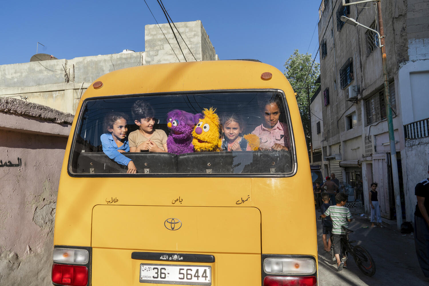 Basma and Jad from 'Ahlan Simsim' take the bus with new friends in Amman, Jordan