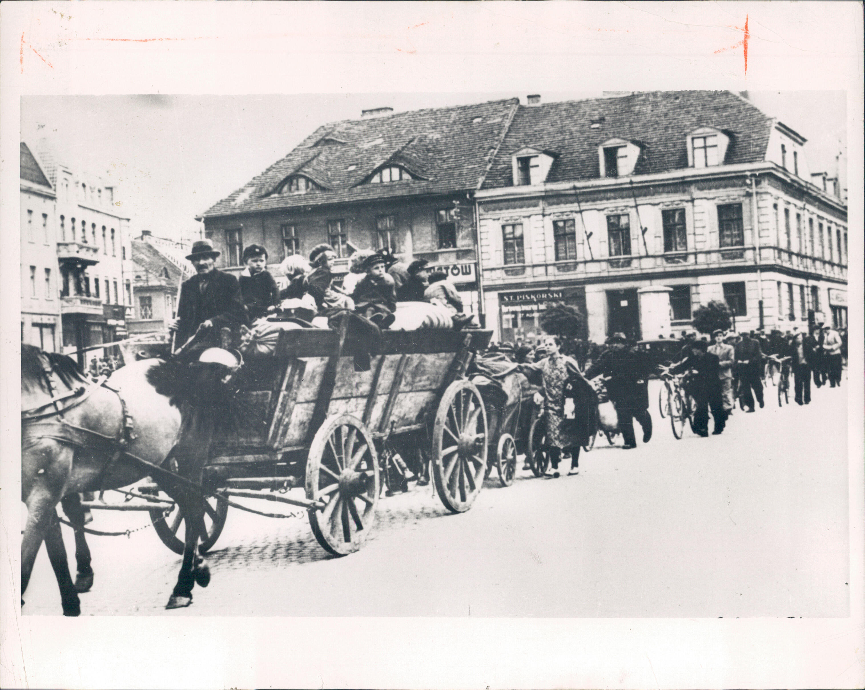 Polish refugees in a horse-drawn cart with their possessions