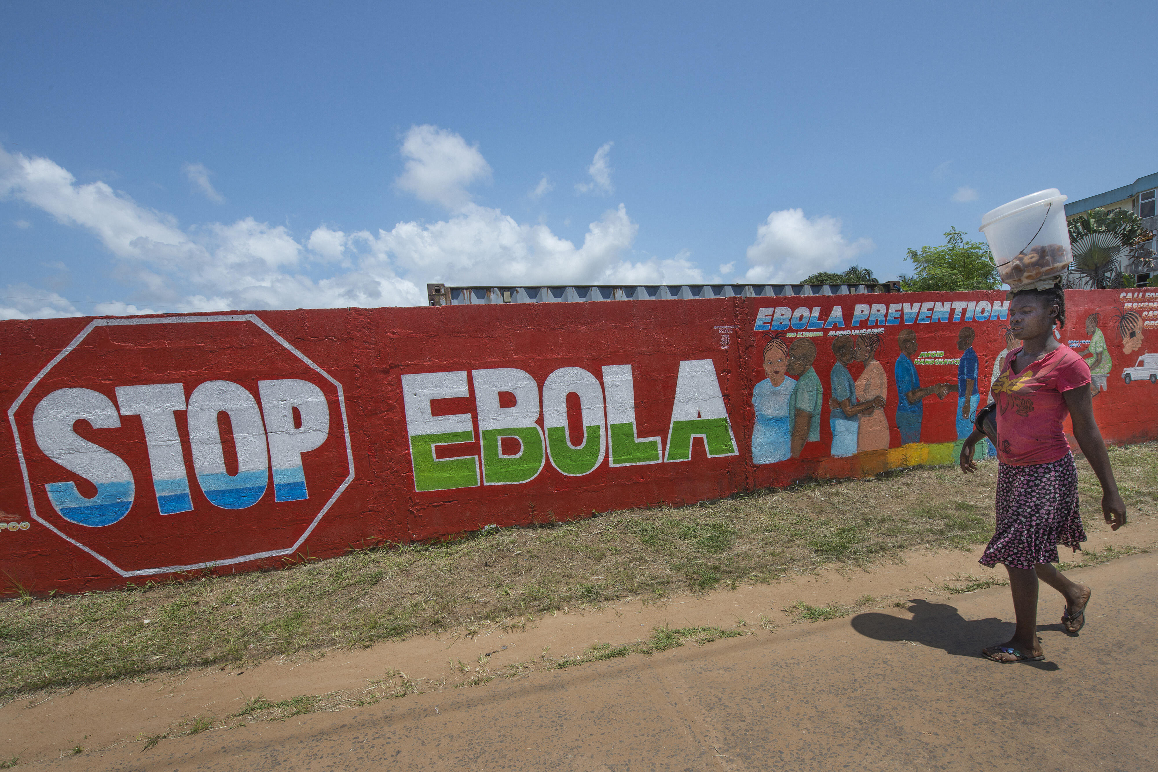 A brightly painted mural in Monrovia, Liberia reads "Stop Ebola"