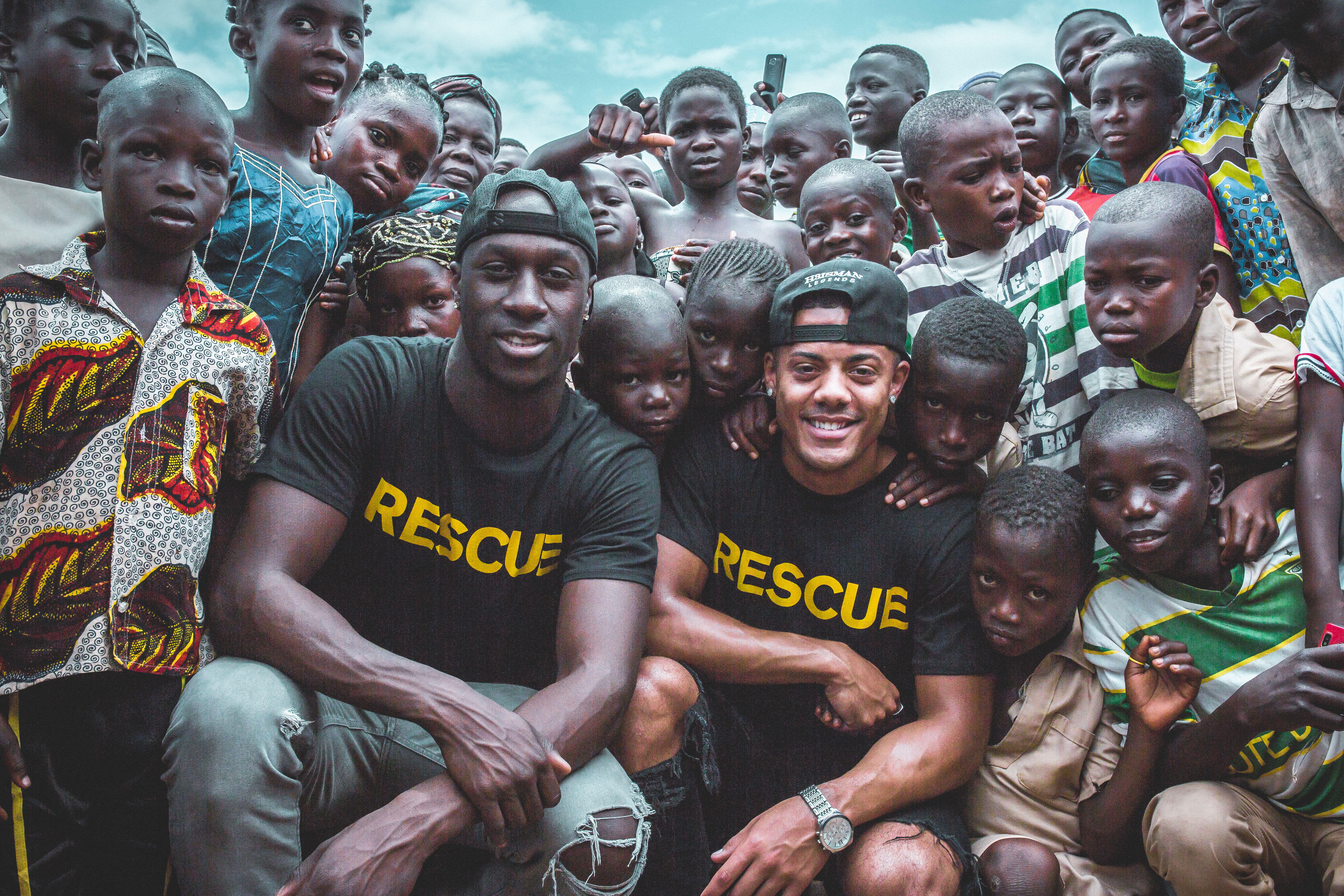 Nico & Vinz with a group of children in Ivory Coast