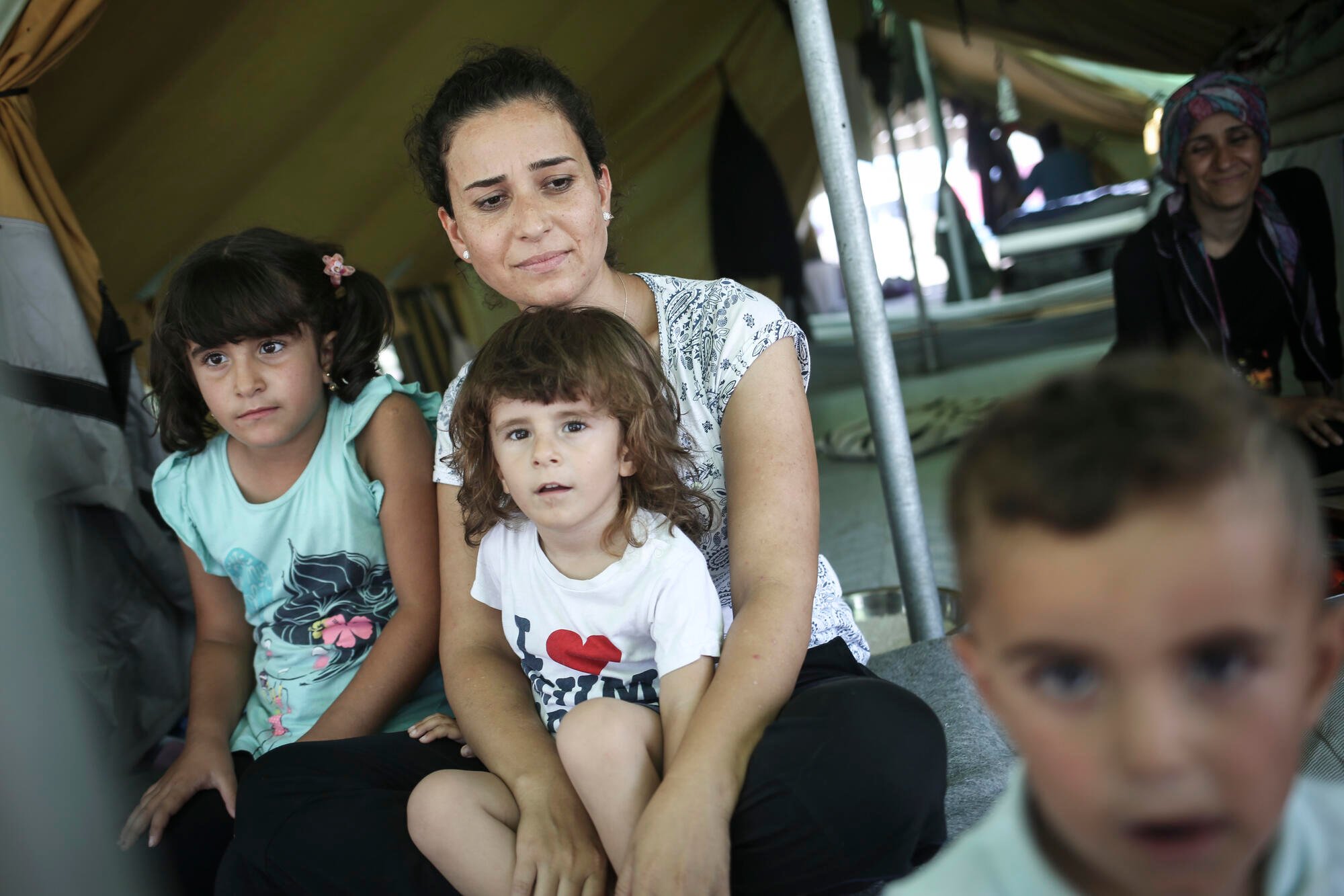 Syrian family in Alexandria refugee camp in Greece.