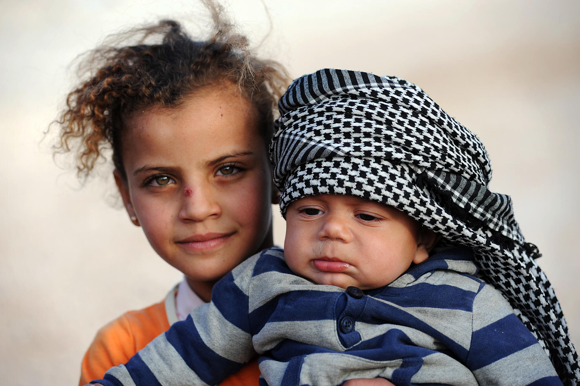 Two Syrian refugee children in Zaatari camp, northern Jordan.