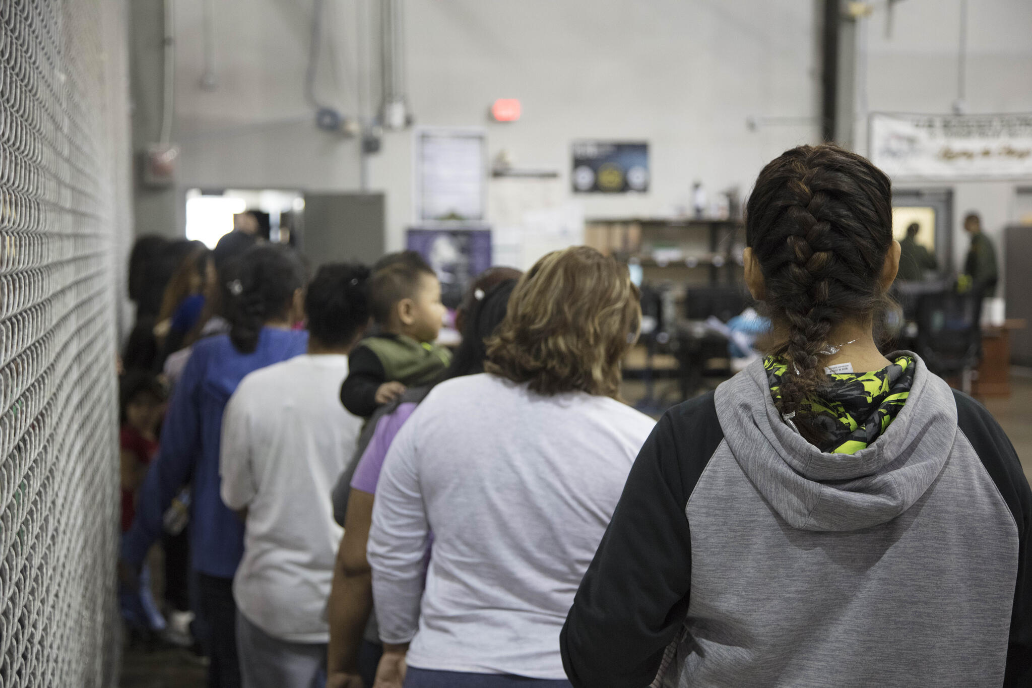 U.S. Border Patrol agents conduct intake of border crossers at the Central Processing Center in McAllen, Texas, Sunday, June 17, 2018. 