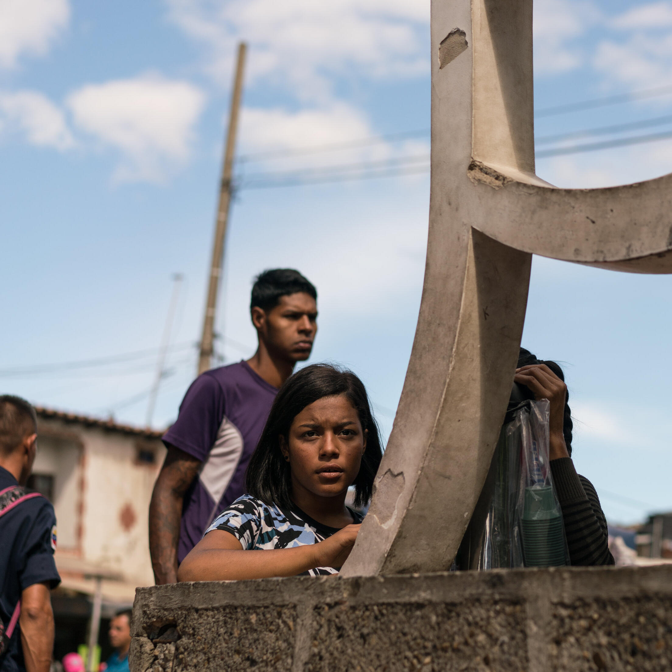 A young girl on the Simon Bolivar Bridge, Colombia. May 22, 2018.
