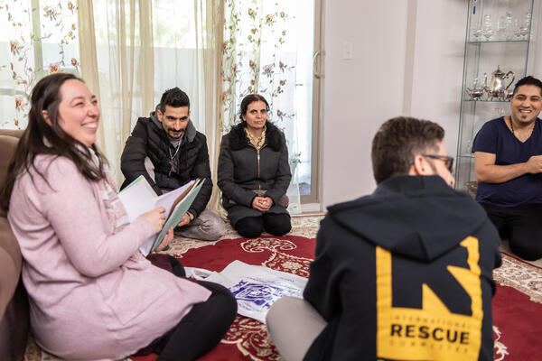 IRC staff in Seattle with an Iranian refugee family