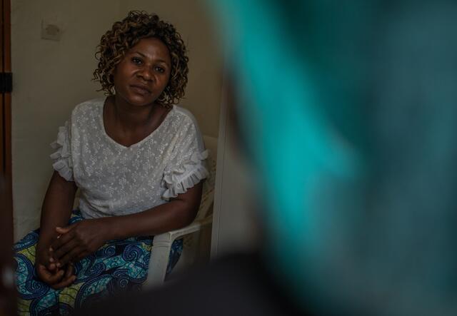 Jeanne Katungu sitting on a chair looking sad