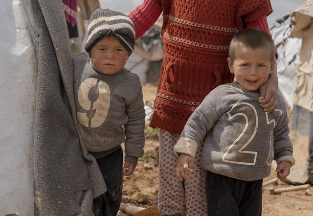 Two little boys with their mother