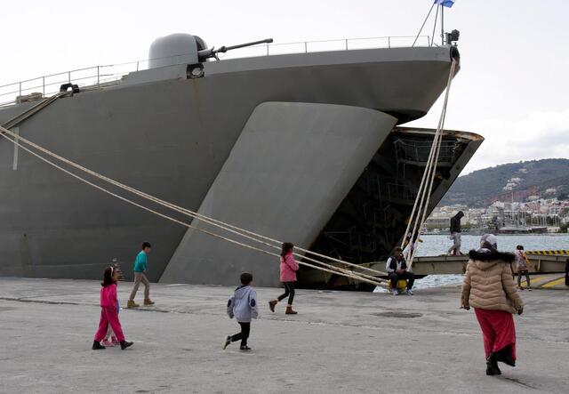 450 people are currently detained on this navy ship in Lesvos, Greece, reports suggest the government plan to deport them back to the countries they've fled from.