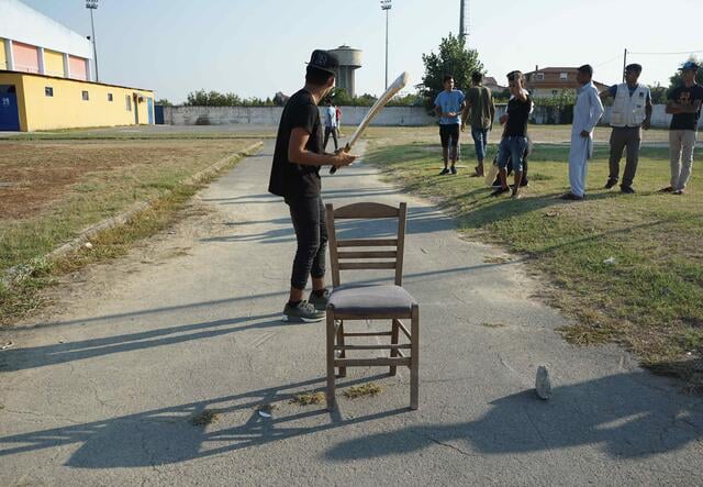 Young people in Greece playing cricket