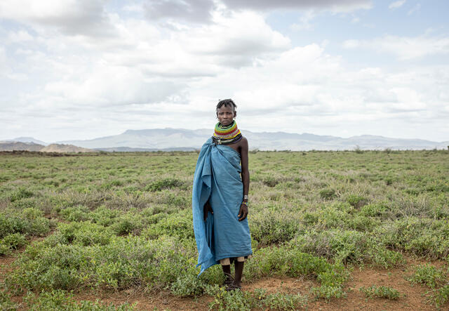 Lokiyoto Ekal, 30 poses for a portrait near her home in RukRuk village in Turkana, Kenya