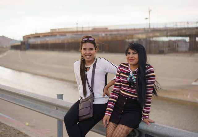Gianna and Fernanda pose at the US-Mexico border