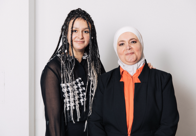 Marah and Razan pose for a portrait
