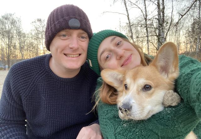 A selfie of Inna with her husband and dog in the snow