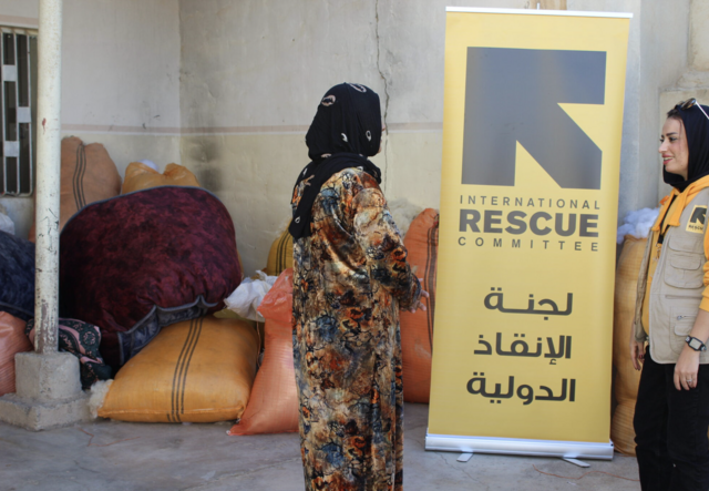 Sarah speaks to an IRC staff member in Iraq.