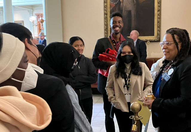 The IRC in Atlanta's Youth Futures students talking with Senator Kim Jackson in the State Capitol.