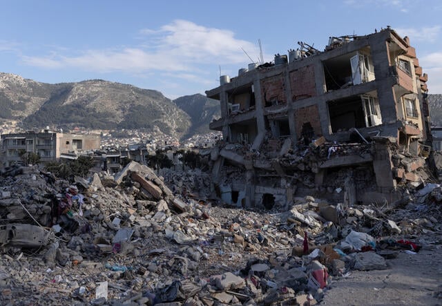 The remains of a Syrian building destroyed in the earthquake near the Turkish border.
